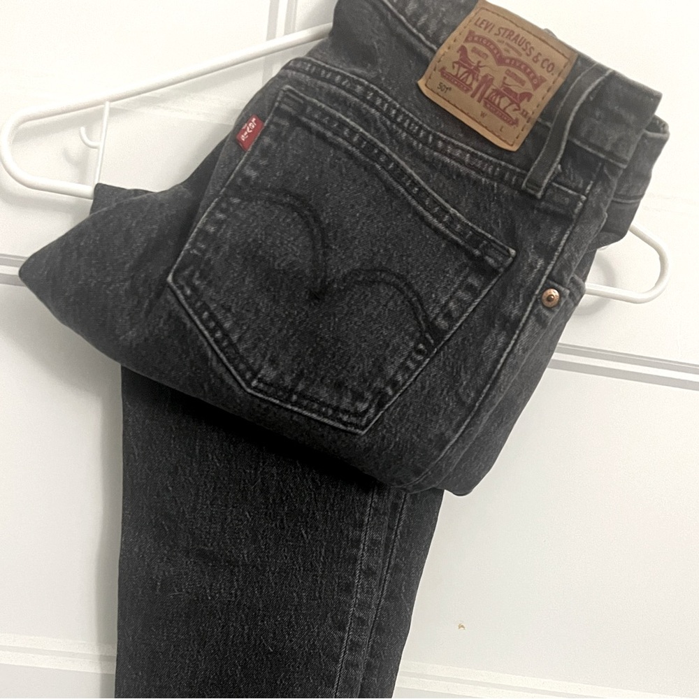501 Levi skinny black jeans raw hem